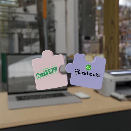 Two Interlocking Puzzle Pieces, Each Bearing the Label QuickBooks, Symbolizing the Integration and Compatibility with QuickBooks Accountant Desktop Software