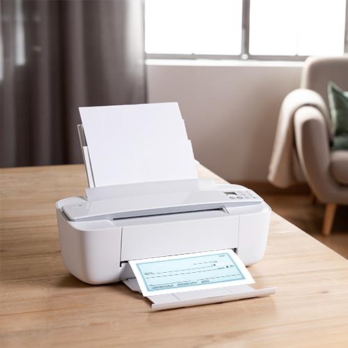 A Printer Sitting on a Wooden Table, Ready to Print Business Checks At Home