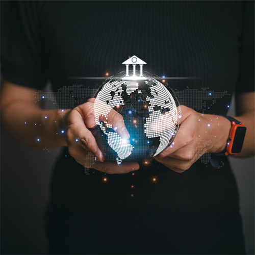 An Individual Holding a Globe in Her Hands. The Image Represents Wire Transfer International