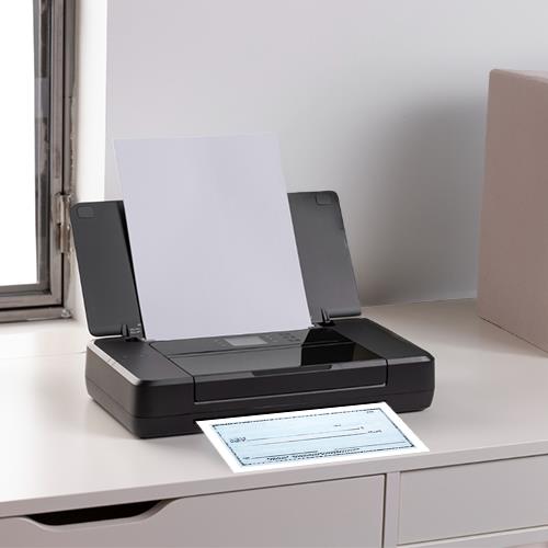 A Printer Sitting on Top of a Desk, Ready to Print Checks From Home
