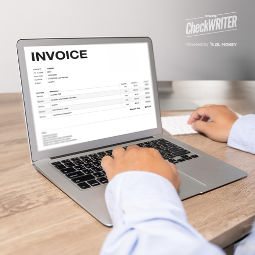 A Person Reviews an Invoice on a Laptop Screen, Utilizing Send Invoices Free to Automate Financial Management.