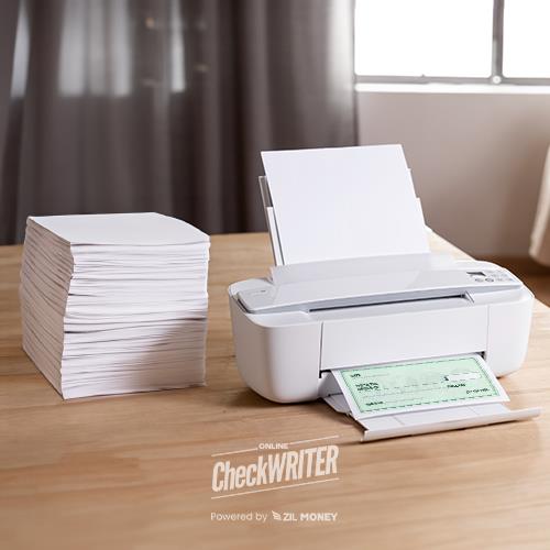A Compact White Printer Sits on a Wooden Desk, Printing a Green Check. Next to the Printer Is Another Check and a Large Stack of Blank Personal Check Paper.