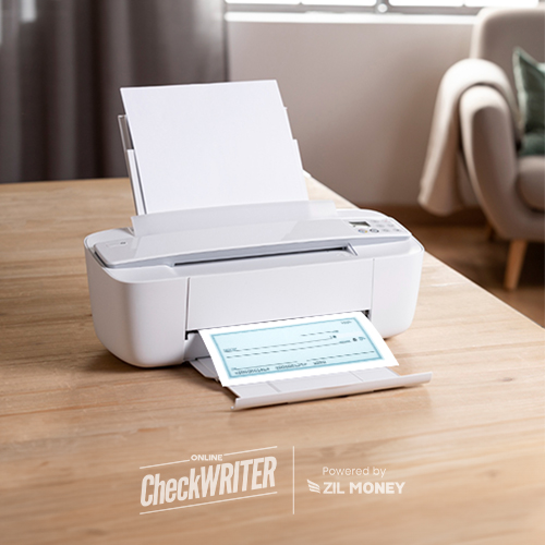 A Compact Printer to Print A Check Online Securely and Instantly on a Wooden Table, with an Open Check Visible on Its Display, in a Room Setting