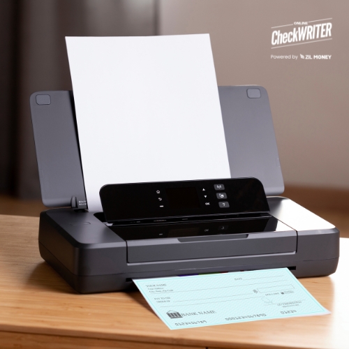 A Printer Is on the Table. Printing Checks Using Blank Check Paper