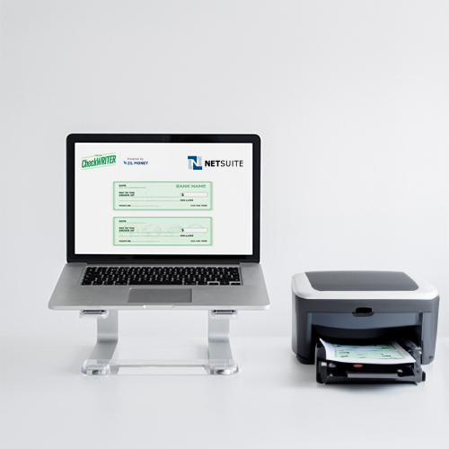 An Image That Shows a Printer and a Laptop, The Printer Conveniently Printing NetSuite Checks