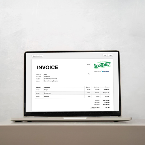 Send Invoices Visible on a Laptop on the Table to Simplify Your Finances