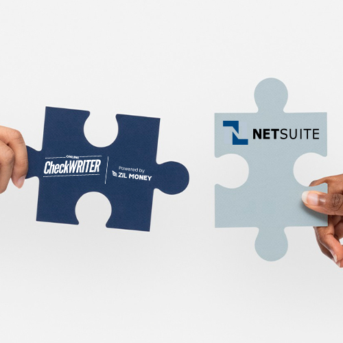 Two Hands Hold Puzzle Pieces Against a White Background. This Indicates OnlineCheckWriter.com – Powered by Zil Money Integration with NetSuite