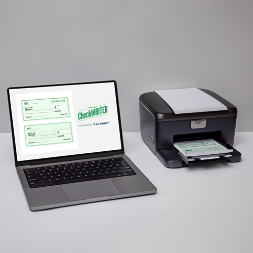 A Laptop And Printer Printing Checks. Conveniently Check Printing, Save Money, and Customize Your Check