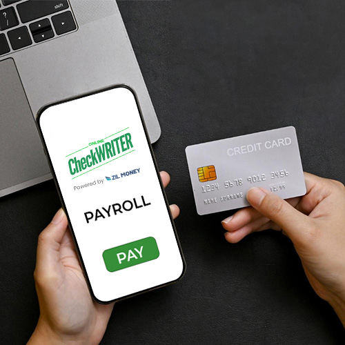 A Person Pay Payroll With Credit Card Through a Mobile Phone That Shows a Payroll Services Page