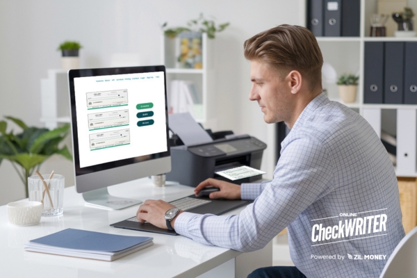 A Man Print Online Check Using A Regular Printer And Blank Paper.How To Print Checks Online, Effortless Business Payment Solution