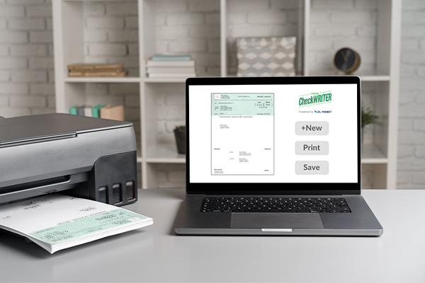 A Laptop and a Printer Printing Business Checks Easily Instead of Ordering Them From Home Or Office