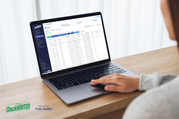 A Person Working On Using His Laptop, That Shows Checkbook Register Interface, Enhancing Financial Efficiency for Business Finance