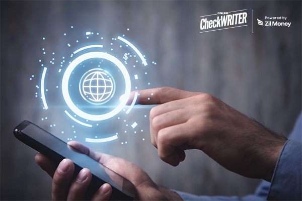 A Person Using a Smartphone Interacts with a Glowing Globe Icon, Symbolizing the Convenience of Secure International Payments Online.
