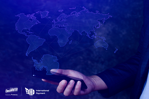 A Man Using A Mobile To Make Fast International Payments with a Mobile App. Complete Transfers in Minutes