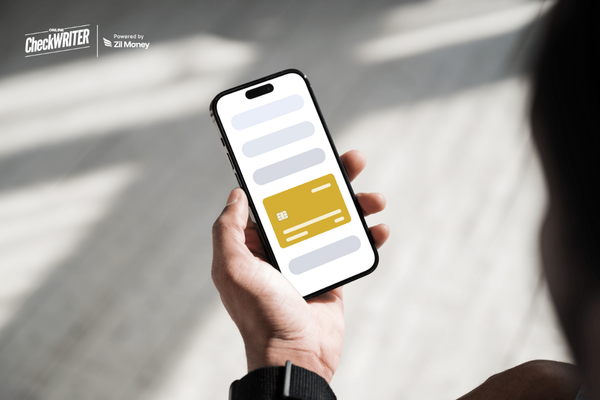 A Man Using A Phone to Make a Virtual Card Fast. Access ACH & Wire