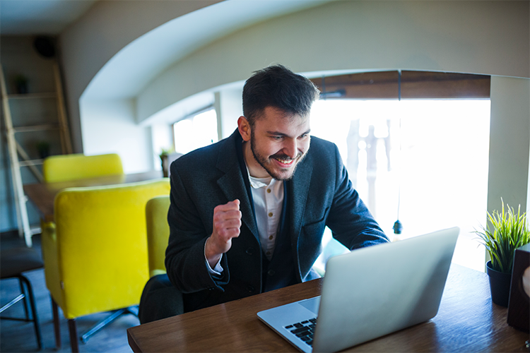 A Businessman Using a Laptop to Make a Virtual Card. Issue Vendor Payment Cards Instantly with Set Spending Limits and Real-Time Tracking for Secure, Efficient, and Organized Vendor Payments