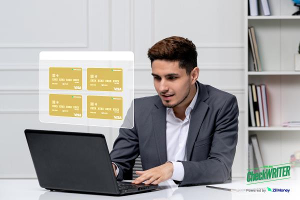 A professional manages virtual cards on a laptop, highlighting Mass Card Deployment for team efficiency.