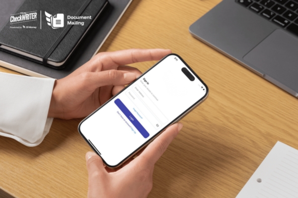 Mail Documents Online in 2025: Why Speed, Security, and Simplicity Matter More Than Ever A Person Holds a Smartphone Displaying a Login Screen for an App to Mail Documents Online