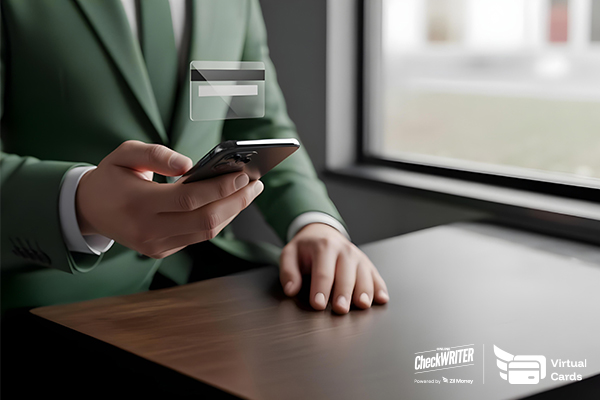 A Man in a Suit Uses His Phone to Access a Virtual Card for Fast and Secure Business Payments.