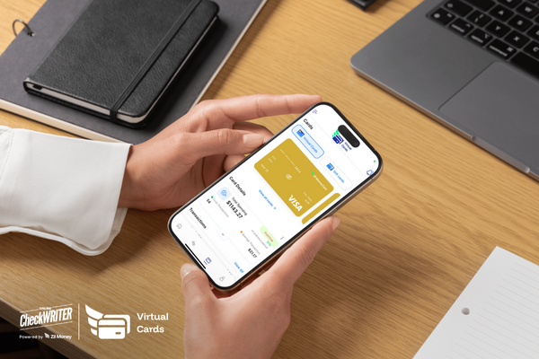 A person uses a phone app showing a virtual card for secure and quick business payments.