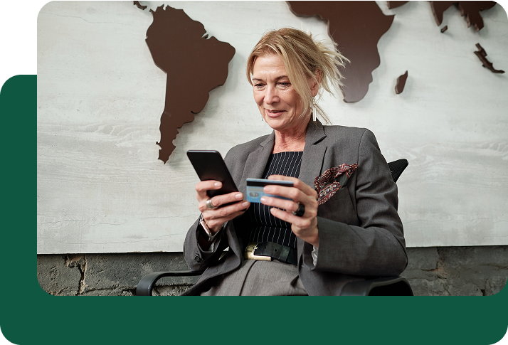 A Persons Using a Tablet to Make International Payments Easily, Send Money to Philippines from USA – Fast, Secure & Low-Cost