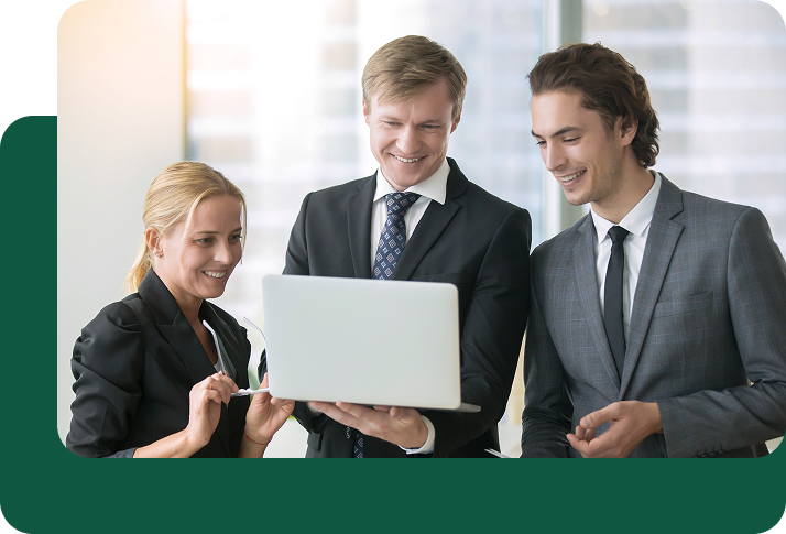 3 Persons Using a Laptop to Make International Payments Easily, Send Money to Philippines from USA – Fast, Secure & Low-Cost