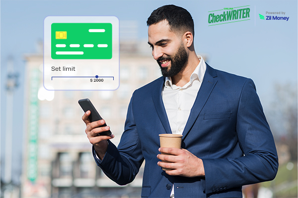 Man with a beard holds a coffee and phone, viewing a digital slider to set a Spending Limit Virtual card budget.
