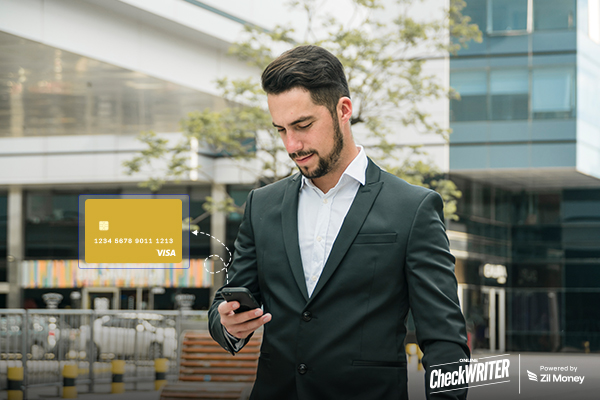 5 Reasons Wallet-Funded Business Cards Are the Smarter Way to Control Team Spending A Person Holding a Smartphome Creating Virtual Cards, 5 Reasons Wallet-Funded Business Cards Are the Smarter Way to Control Team Spending