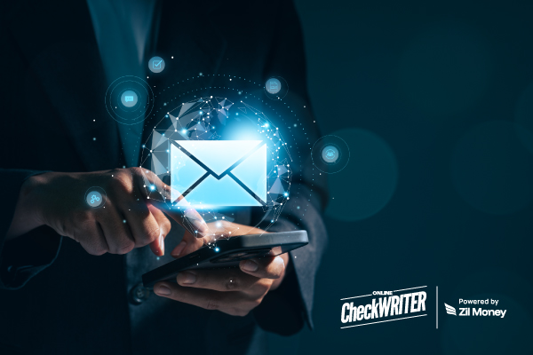 A Man Using A Mobile to Make Payment via Check Mail Easily. Check Mailing in the Modern Business World: Powered by Innovation