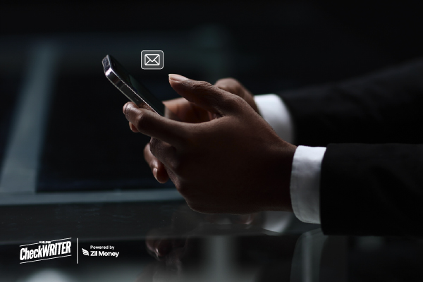 The Liberation Roadmap: How Check Mailing Savings Plus Strategic Benefits Drive Total Financial Freedom Today A Man Using A Phone to Make a Check Mailing Easily. Simplify Payments with Modern Check Mailing