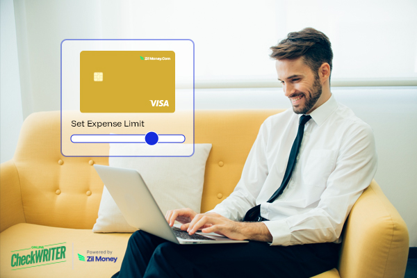 A Man Using A Virtual Card and Laptop to Make Payments Easily. Florida Expense Card Empowers Businesses to Create, Control, and Track Employee Spending
