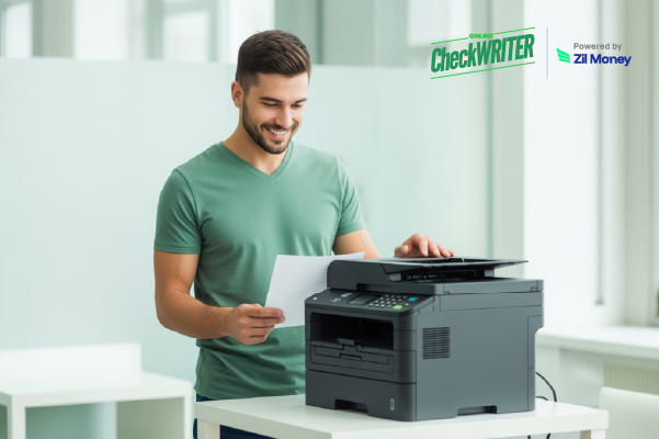 From Waiting to Velocity: 4 Instant Checks Trends That Define Simplicity for Modern Business Today A Man Using A Printer to Print a Check Instantly. Instant Checks Let Businesses Create and Print Payments Instantly, Reducing Delays