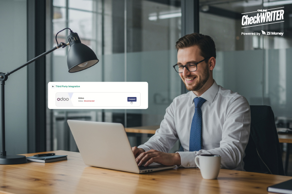 One Update, Everywhere — How Smart Integration Ends Double Entry A Man Using A Laptop to Make a Payment Easily. Odoo Integration Keeping Payments Updated Correctly