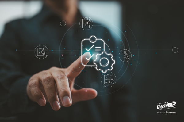 A Man Showing OnlineCheckWriter.com Integration with Odoo. Simplify Bill Payments with Odoo Integration