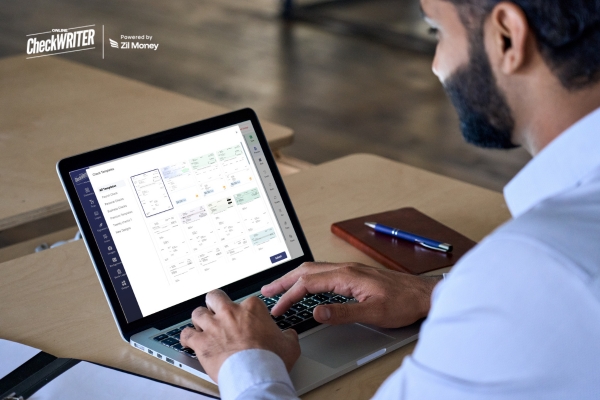4 Ways a Modern Check Template Solution Eliminates Check Concerns for Businesses in 2025 A Man Using a Laptop to Browse a Professional Check Template Gallery on the Online Check Writer Software Platform.