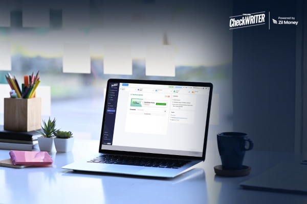 Scaling Payments Without Breaking Infrastructure Through Efficient Integration Laptop displaying payment dashboard with QuickBooks integration for accurate and secure transaction management.