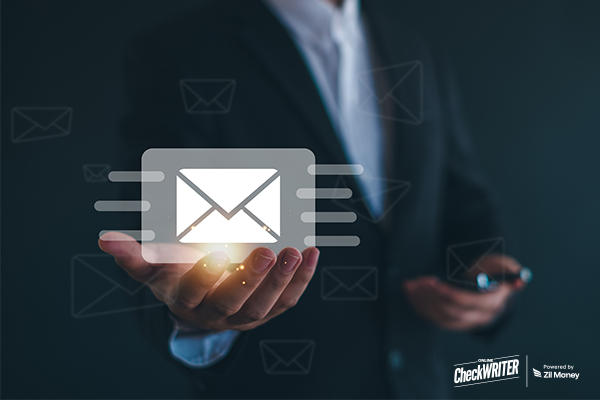 7 Reasons Smart Business Owners Are Switching to Check Mailing in 2026 Person uses a business card app on a smartphone to avoid old, slow Check Mailing for business expenses.