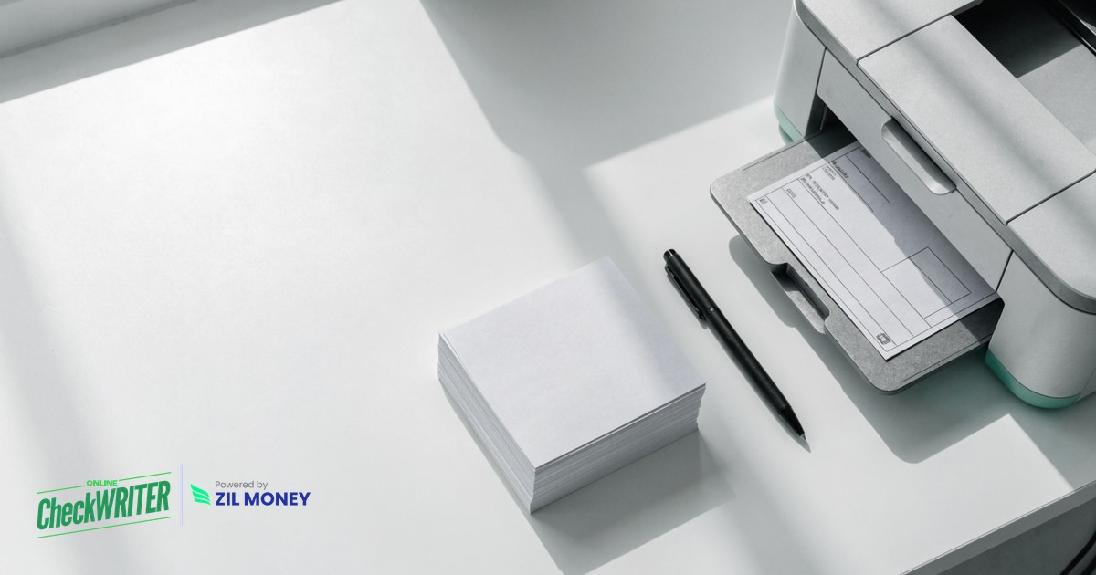 Print check online free on blank check stock Printer producing a business check beside blank check stock, used to print check online free