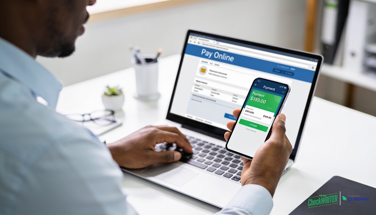 Pay with eCheck online Professional paying online from a laptop and phone, illustrating how to pay with eCheck online