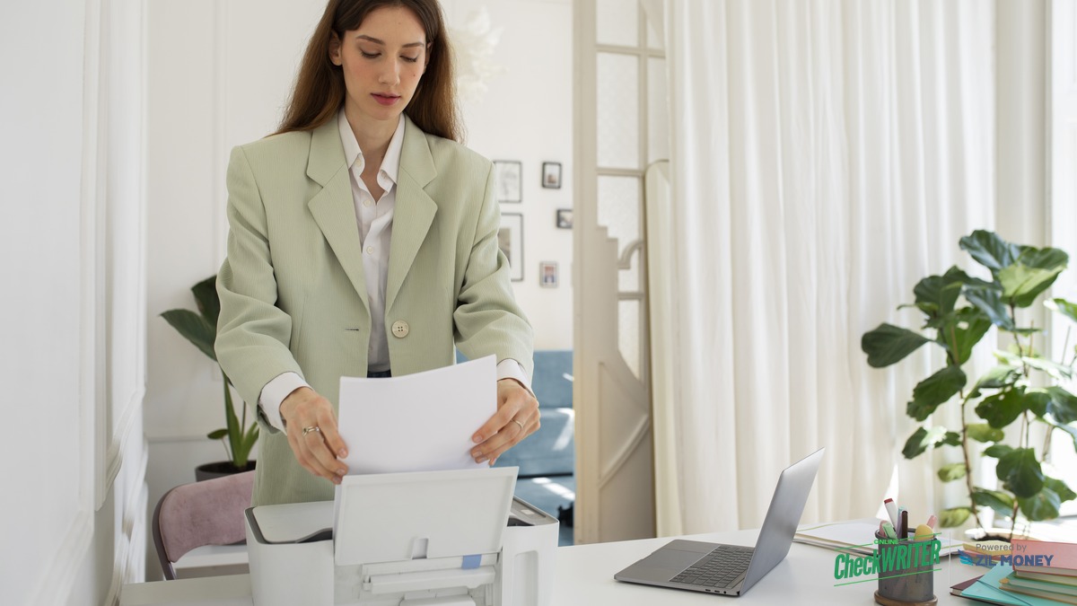 Check Design What Every Business Check Layout Needs Business owner printing a custom-designed check with the OnlineCheckWriter logo