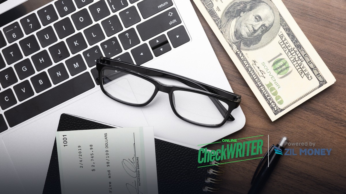 Draft Check: How to Get Paid Faster Without a Signature Draft check next to cash and a laptop on a desk, OnlineCheckWriter.com powered by Zil Money